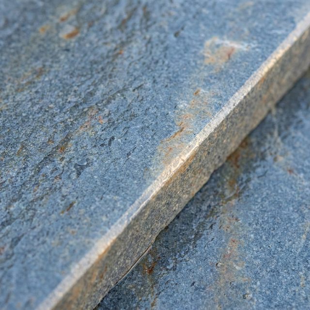 Thermal finish bluestone slab surface, blue grey with buff mottling