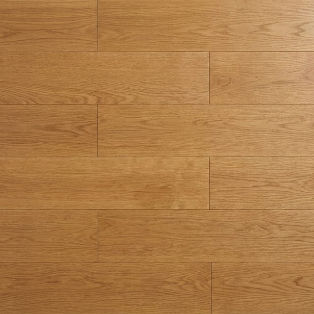Solid oak floorboards laid tight, seen from directly above